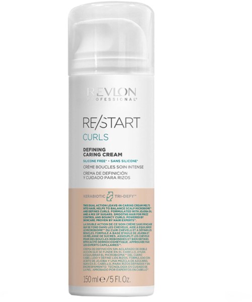 Eine weiße Flasche mit Revlon Re/Start Curls Defining Caring Cream, mit Pumpe, weichem Design und Produktdetails in hellem Text.