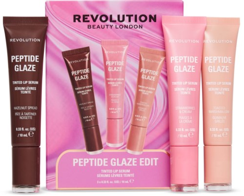 Tre rosa og brune lipserumtuber og en rosa eske med Revolution-logo.