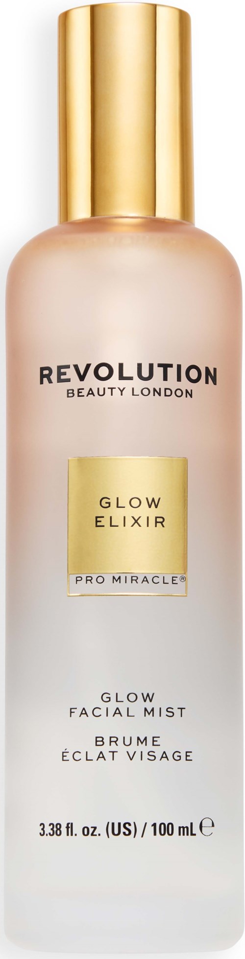 A tall bottle of Revolution Beauty Glow Elixir glow facial mist with a gold cap and minimalist label.