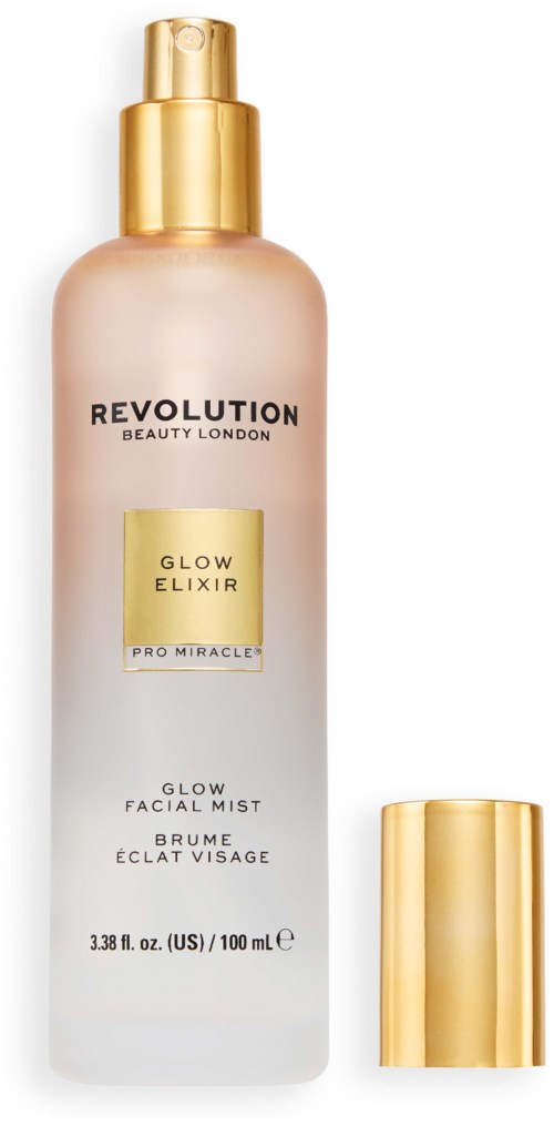 Glow facial mist bottle with gold cap and pump, labeled Revolution Beauty London Glow Elixir, 3.38 fl oz.
