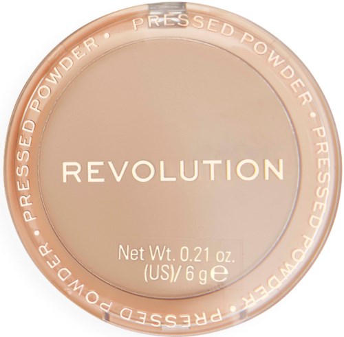 A round beige compact lid with 'Revolution' and weight details on it, surrounded by text about pressed powder.