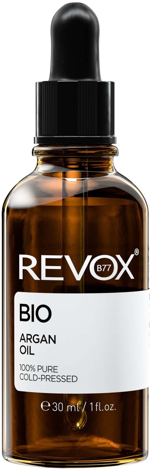 Pieni ruskea lasipullo mustalla tiputuspipetillä, merkintä 'Revox Bio Argan Oil, 100% puhdas, kylmäpuristettu, 30ml'.