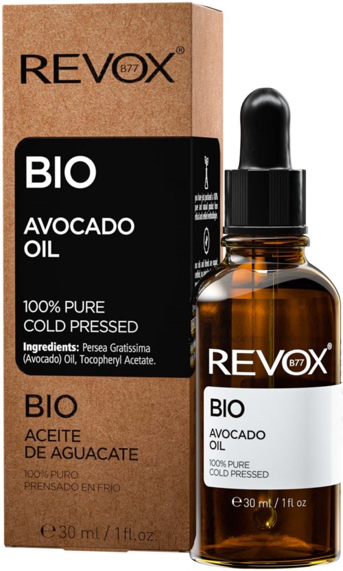 Een kleine bruine fles met pipetdop naast een bruik kartonnen doos. Beide labels zeggen "RevoX Bio Avocado Oil."