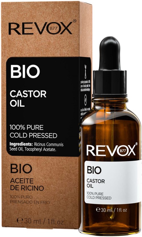 Brunt förpackning med svart och vit etikett, liten glasflaska med dropper, produkten heter Revox BIO Ricinolja.
