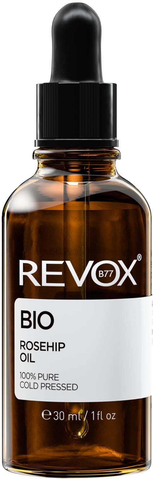 Tumma ruskea lasipullo tip按摩, merkitty REVEX BIO Rosehip Oil, 100% puhdas, kylpressätty.