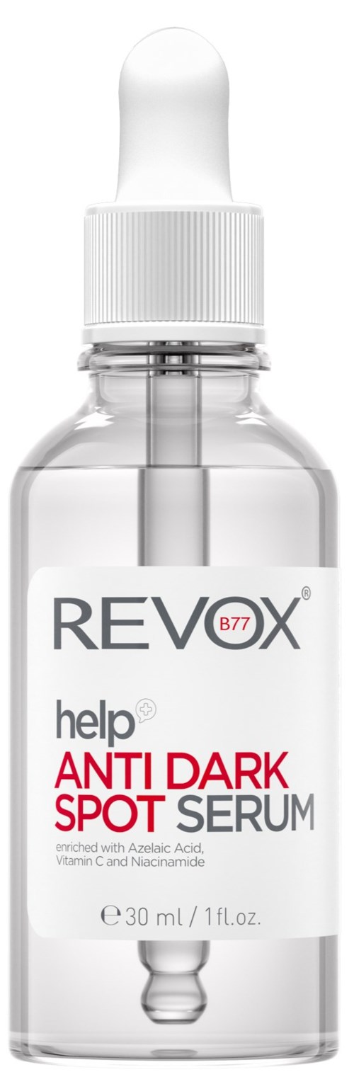 Een helder glazen druppelflesje van Revox help anti dark spot serum met witte etiket en witte dop.