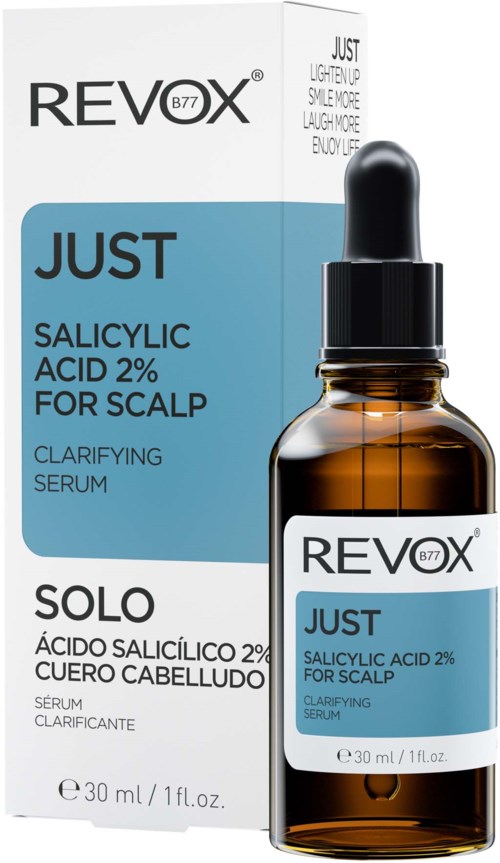 En eske og en liten flaske med dråpeteller, begge merket Revox Just Salisylsyre 2% for hodebunn.