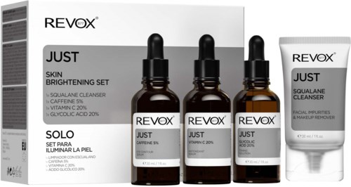 Huidverzorgingsset met drie kleine flessen en één tube, inclusief een reiniger en make-up remover.