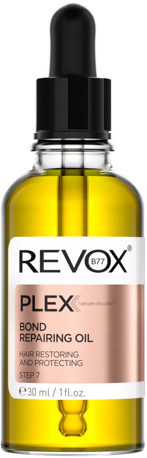 Kleine glazen fles met gele olie, zwarte pipetdop, en een label voor haarherstel.