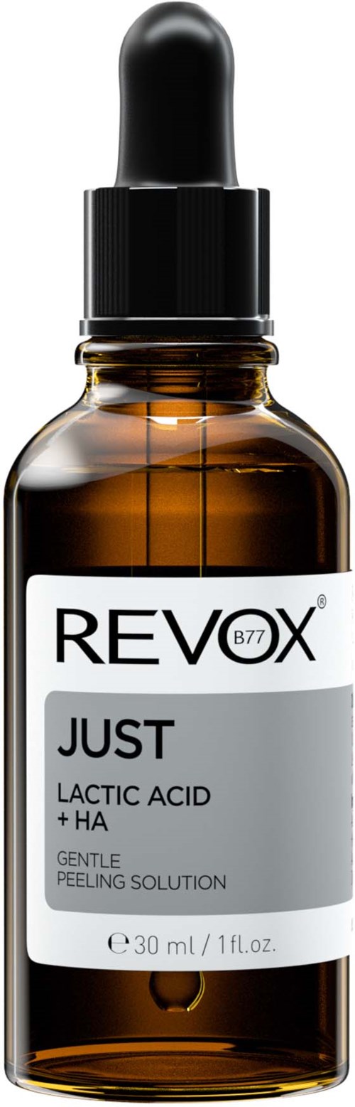 Kleine bruine glazen fles met zwarte druppeldop, gemerkt 'Revox Just Lactic Acid + HA'.