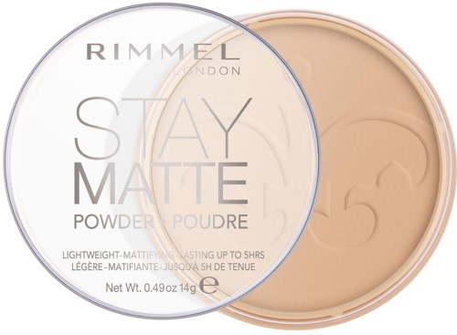 A compact of Rimmel Stay Matte powder with clear lid, beige-colored pressed powder inside, and text describing product details.