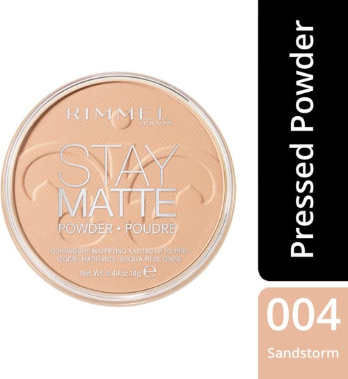 A round compact powder container with beige powder labeled "Stay Matte." Black label says "Pressed Powder."