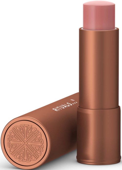 Läppstift i rosa guldbehållare med ett dekorativt mönster på botten.