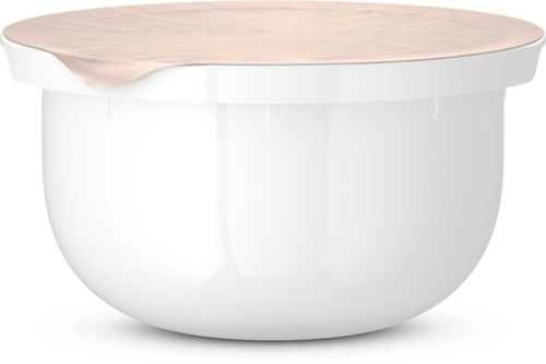 En hvit bolle med beige topp, enkel og moderne i design.