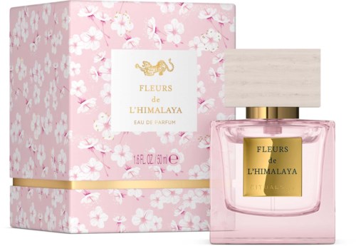 A pink floral perfume box with a clear bottle and gold label, named Fleurs de L'Himalaya.