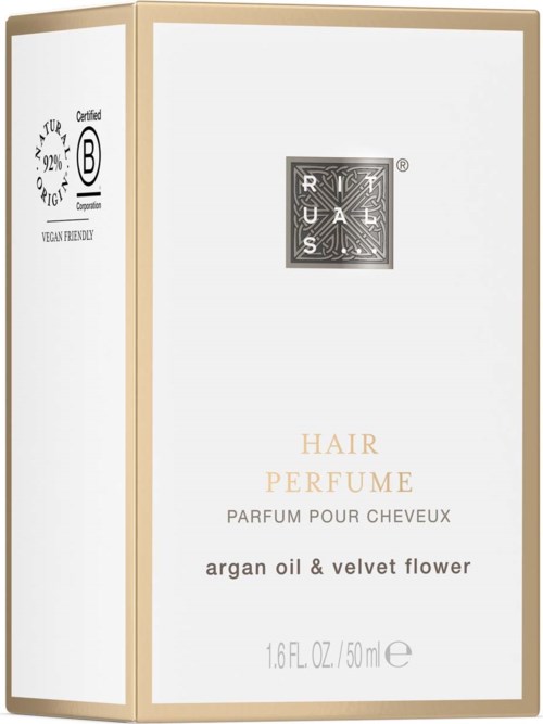 The box displays a perfume labeled for hair, with notes of argan oil and velvet flower, in white and gold colors.