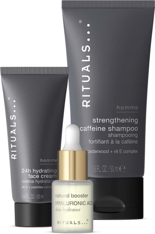 Zwei Tuben Rituals Männerpflegeprodukte und eine kleine Flasche Booster-Serum werden gezeigt.