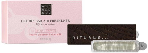 Ein luxuriöser Auto-Lufterfrischer mit Kirschblüten- und Reis-Milch-Duft, in rosa Verpackung mit schwarzem Streifen.