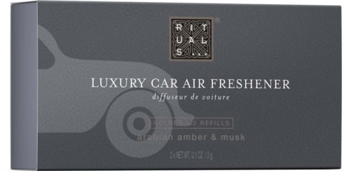 Eine Schachtel Luxus-Autoduftspender mit Duft nach arabischem Bernstein und Moschus. Stilvolles schwarzes und graues Design.