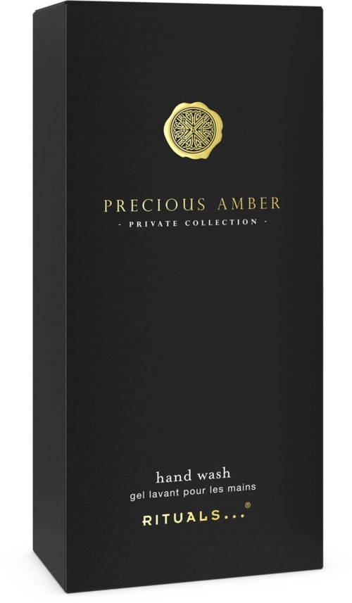 Svart eske med gull emblem og tekst for Precious Amber håndsåpe fra Rituals.