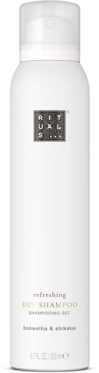 Vit flaska med Rituals avkylande torrschampo med svart etikett och silverlogga, 200 ml.