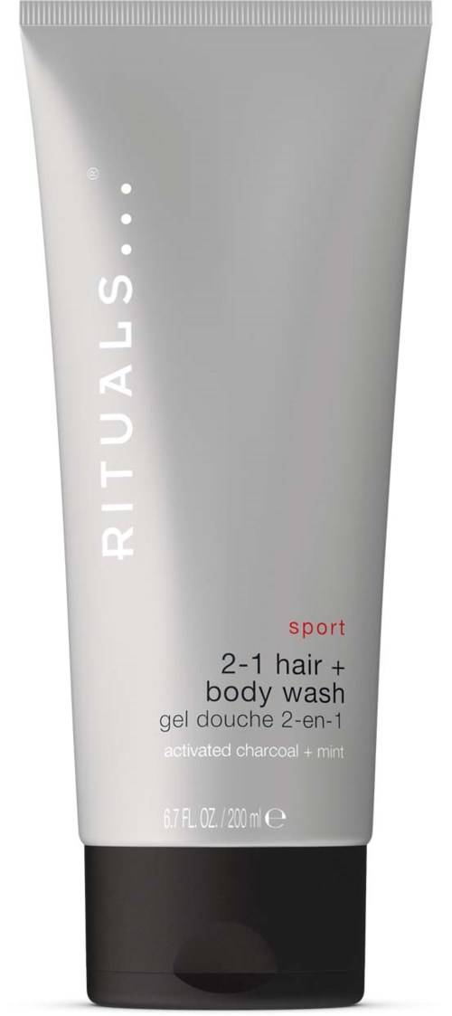 Eine weiße und graue Tube mit Rituals sport, für Haar- und Körperwäsche, mit Minze und Aktivkohle.