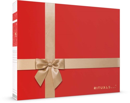 En röd låda med beige band och rosett, märkt 'RITUALS...'. Det ser ut som en presentask eller förpackning.