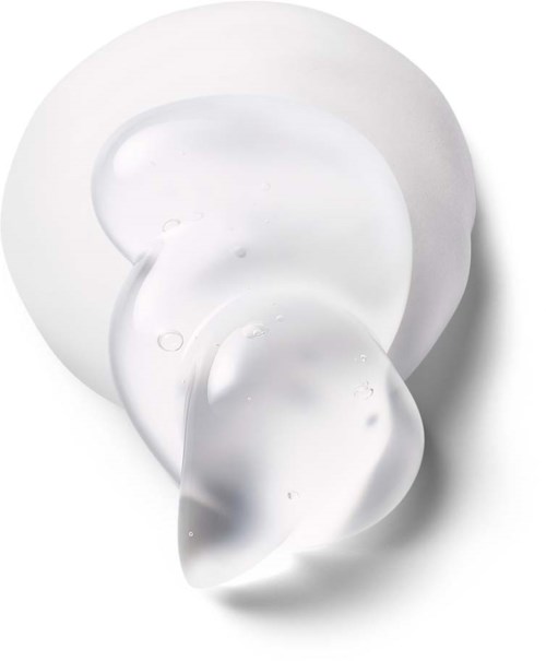 A clear gel with a slight shine, shaped like a spill or blob, on a white background.