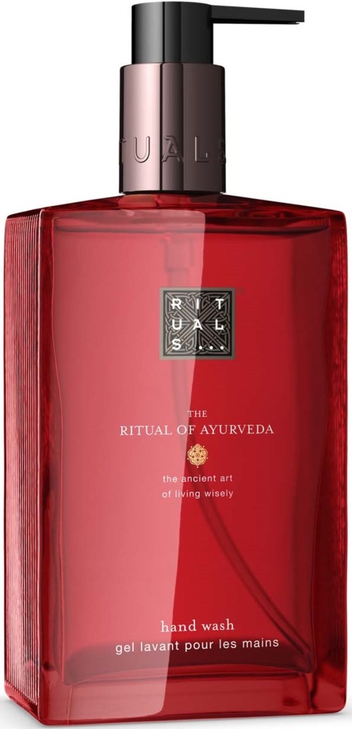 Rote Handseifenflasche mit schwarzem Pumpkopf, gekennzeichnet Ritual of Ayurveda, zeigt alte Kunst des klugen Lebens.