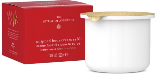 Rote Box mit Goldakzenten, Cremebehälter für Schlagsahne, Deckel leicht offen mit Creme.