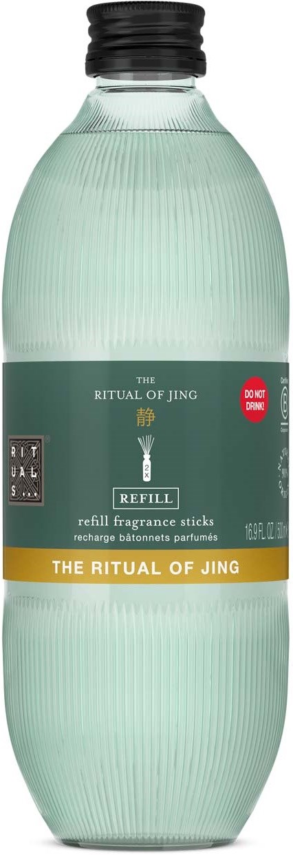 Przezroczysta butelka z czarnym korkiem, oznaczona "The Ritual of Jing" odświeżacz zapachowy. Ma zielone i złote akcenty.