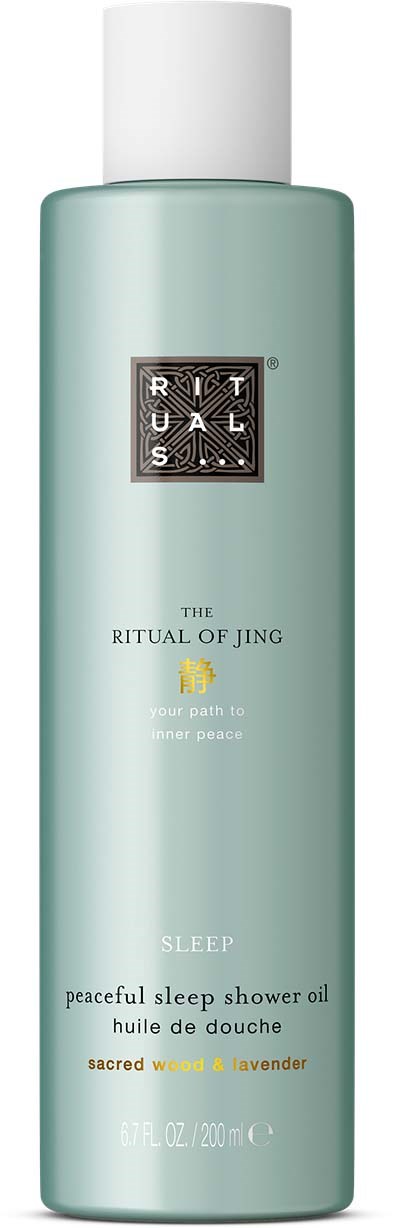 Pitkä vaaleansininen suihkuöljytölkki, valkoinen korkki, merkintä 'The Ritual of Jing Sleep' laventelintuoksu.