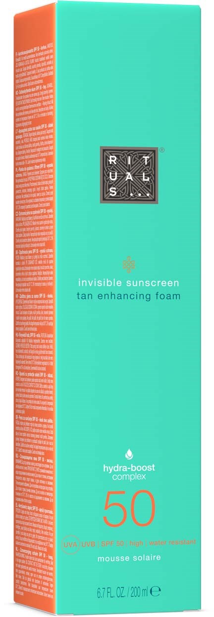 Eine türkise und orangefarbene Schachtel für Sonnencreme namens RITUALS mit SPF 50, als unsichtbarer Sonnencreme und Bräunungsfördernder Schaum.