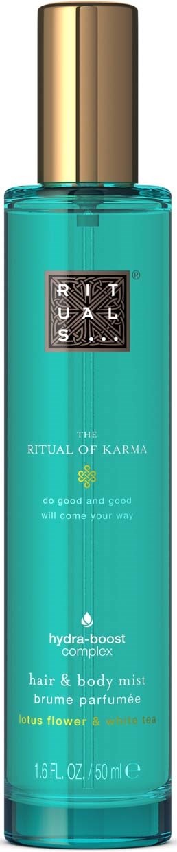 A tall, blue-green bottle with a gold cap holding hair and body mist called Ritual of Karma.