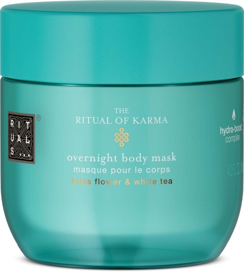 Eine türkisfarbene Dose mit der Aufschrift 'The Ritual of Karma' enthält eine Übernacht-Körpermaske mit Lotusblume und weißem Tee.