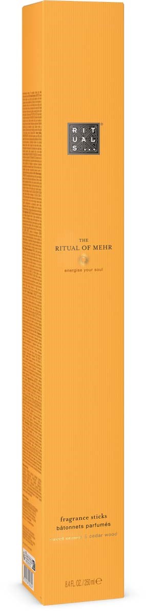A tall, orange box with a black label and text, indicating a fragrance stick product.
