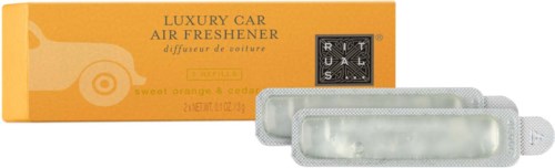 A luxury car air freshener in white and orange packaging with small diffusers.