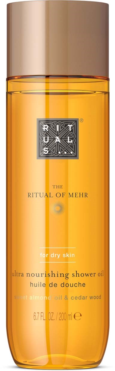 Orange shower oil bottle with a gold cap, labeled Rituel by Rituals for dry skin, contains 200 ml.