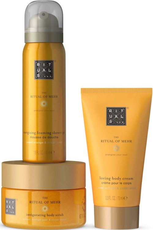 Set mit gelben Hautpflegeprodukten inklusive schäumendem Duschschaum, Körpercreme und Körperpeeling von Ritual of Mehr.