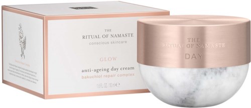 A skincare jar and box labeled 'Glow anti-ageing day cream' and 'Ritual of Namaste' are shown, with a pink and marble design.