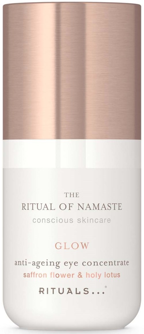 A skincare product labeled 'The Ritual of Namaste Glow eye concentrate' with a rose gold and white design.