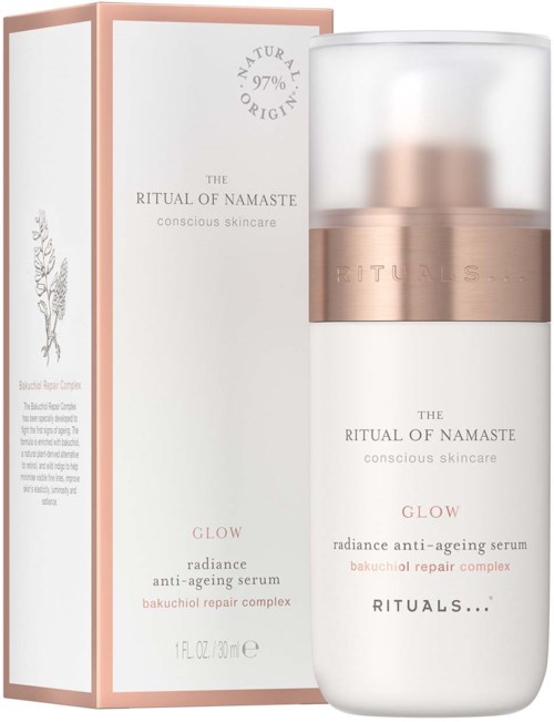 A skincare bottle with a white and rose gold design, shown alongside its box, promoting anti-aging serum with natural ingredients.