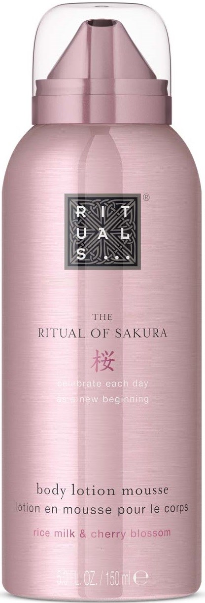 Eine rosa Flasche Rituals Körperlotion-Schaum mit Kirschblütenduft und durchsichtigem Deckel.
