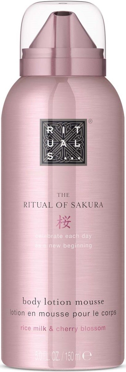Różowa butelka pianki do ciała z zapachem kwiatów wiśni i mleka ryżowego, oznaczona 'Ritual of Sakura.'
