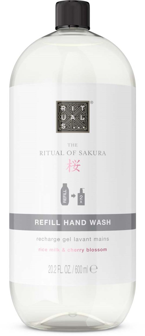 Eine klare Handwaschflasche mit schwarzem Deckel, beschriftet als Ritual of Sakura, mit Kirschblüten- und Beerenduft.