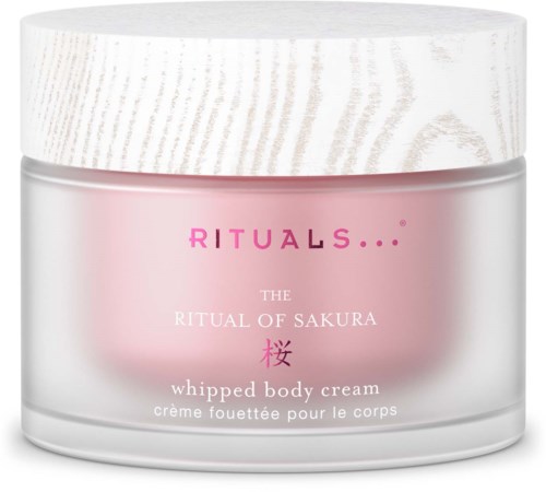 Eine rosa und weiße Körpercreme im Glas mit Holzoptik-Deckel und pinkem Text, bezeichnet als Sakura whipped body cream.