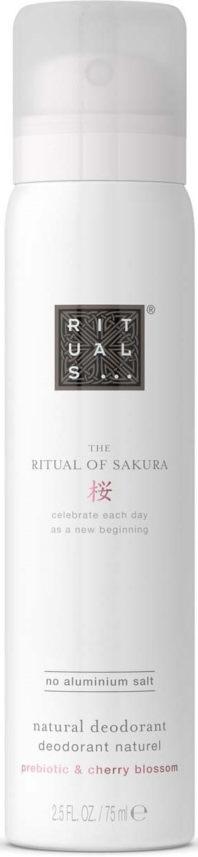 Biała butelka dezodorantu z czarnym i różowym tekstem, oznakowana "The Ritual of Sakura" i "Probiotic & Cherry Blossom."