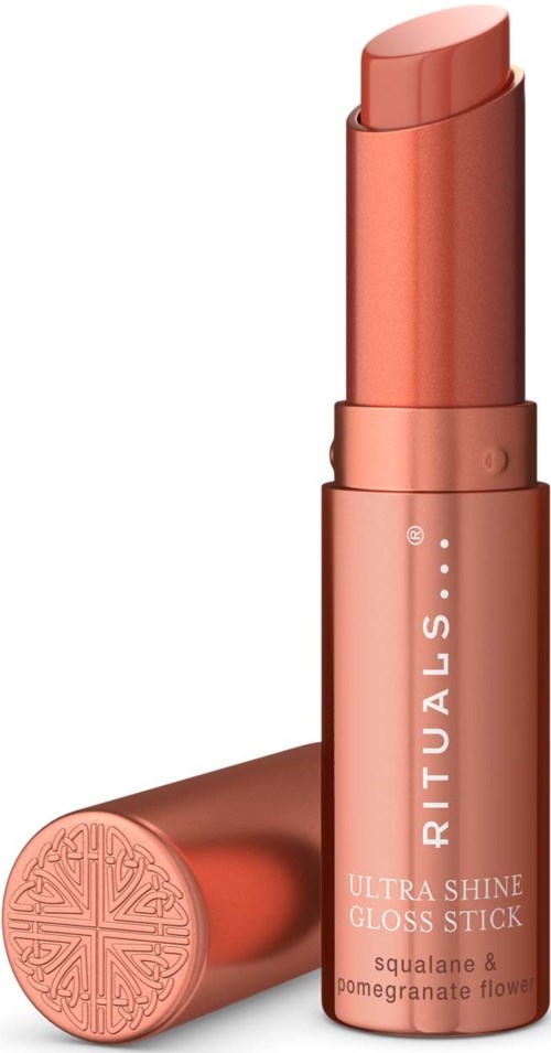 A coral-colored lipstick with the brand name RITUALS and the text ULTRA SHINE GLOSS STICK on the tube.