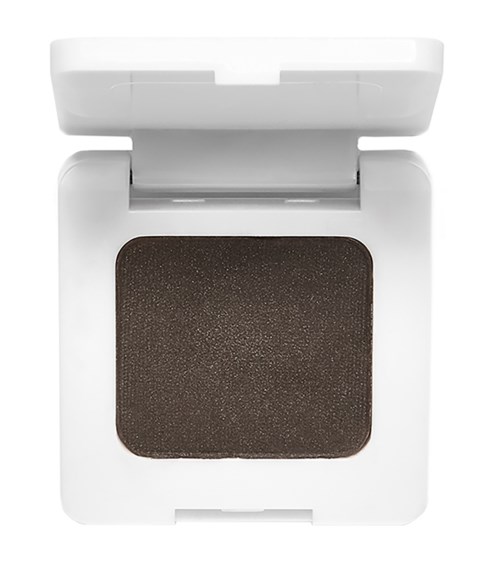 Ein Make-up-Compact mit dunkelbraunem Puder in einem weißen Kunststoffgehäuse.
