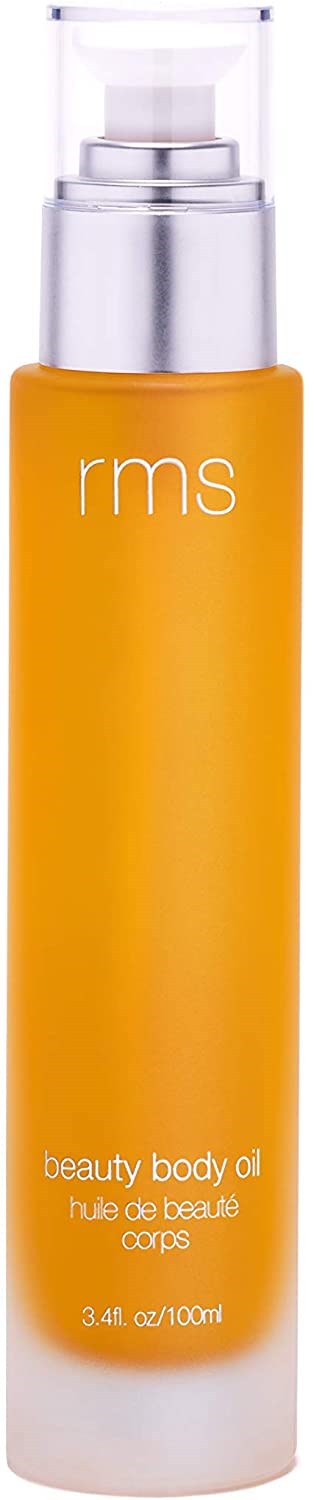 Eine lange, orange Flasche mit klarer Pumpe, beschriftet 'rms' und 'beauty body oil.'
